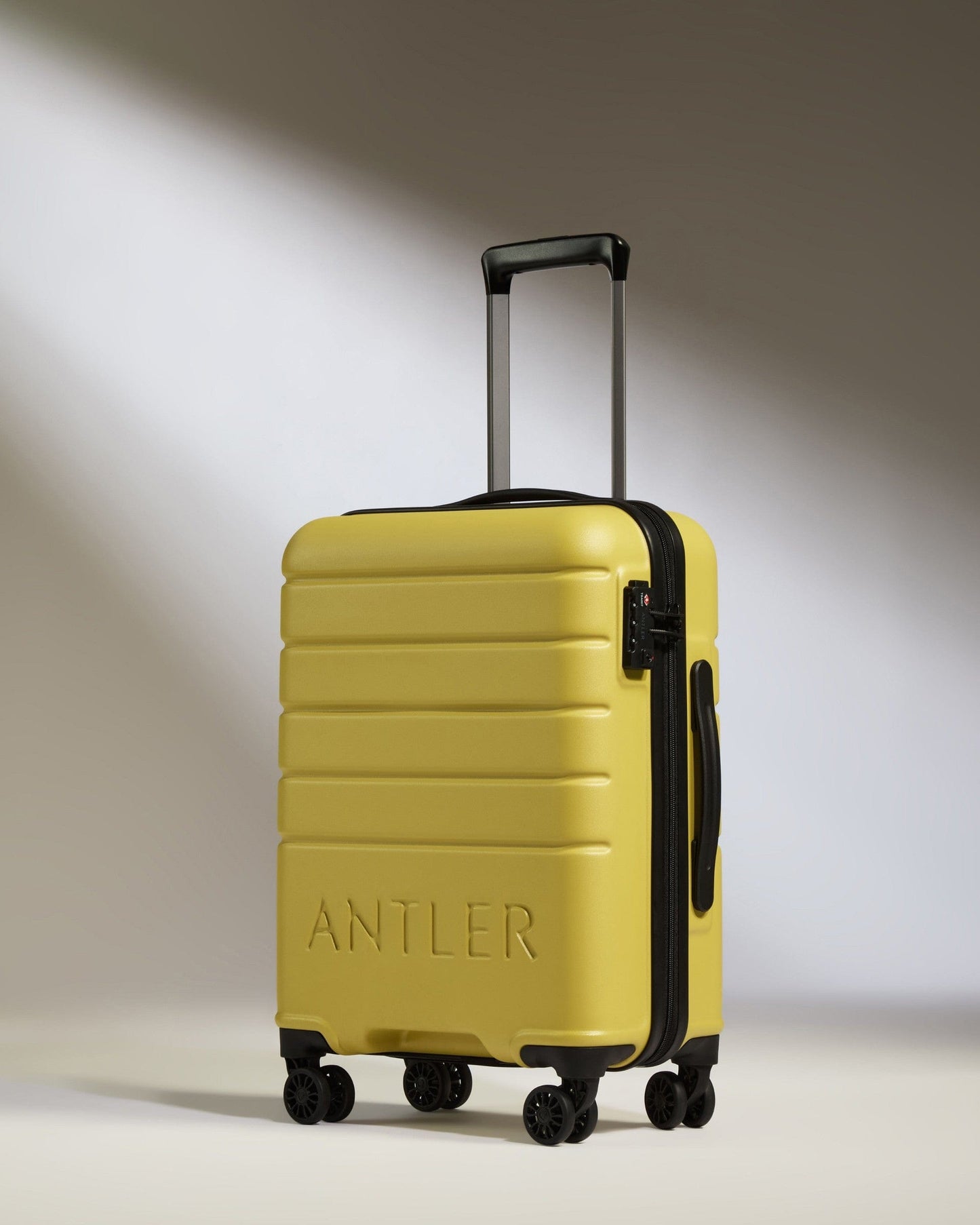 Antler Luggage -  Cabin Suitcase in Mustard Yellow - Logo - Hard Suitcases Cabin Suitcase Yellow - Logo | Lightweight Hard Shell Luggage