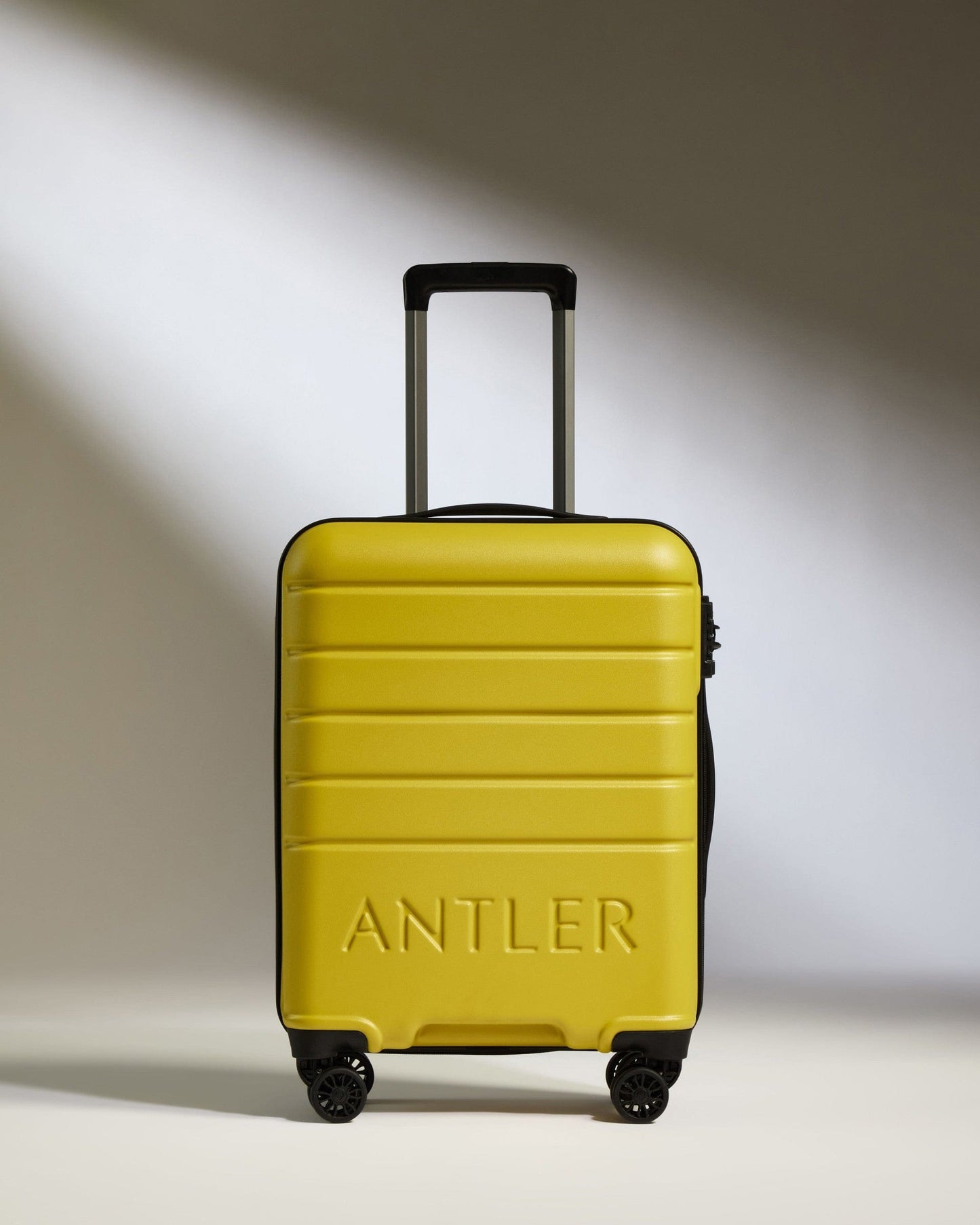 Antler Luggage -  Cabin Suitcase in Mustard Yellow - Logo - Hard Suitcases Cabin Suitcase Yellow - Logo | Lightweight Hard Shell Luggage