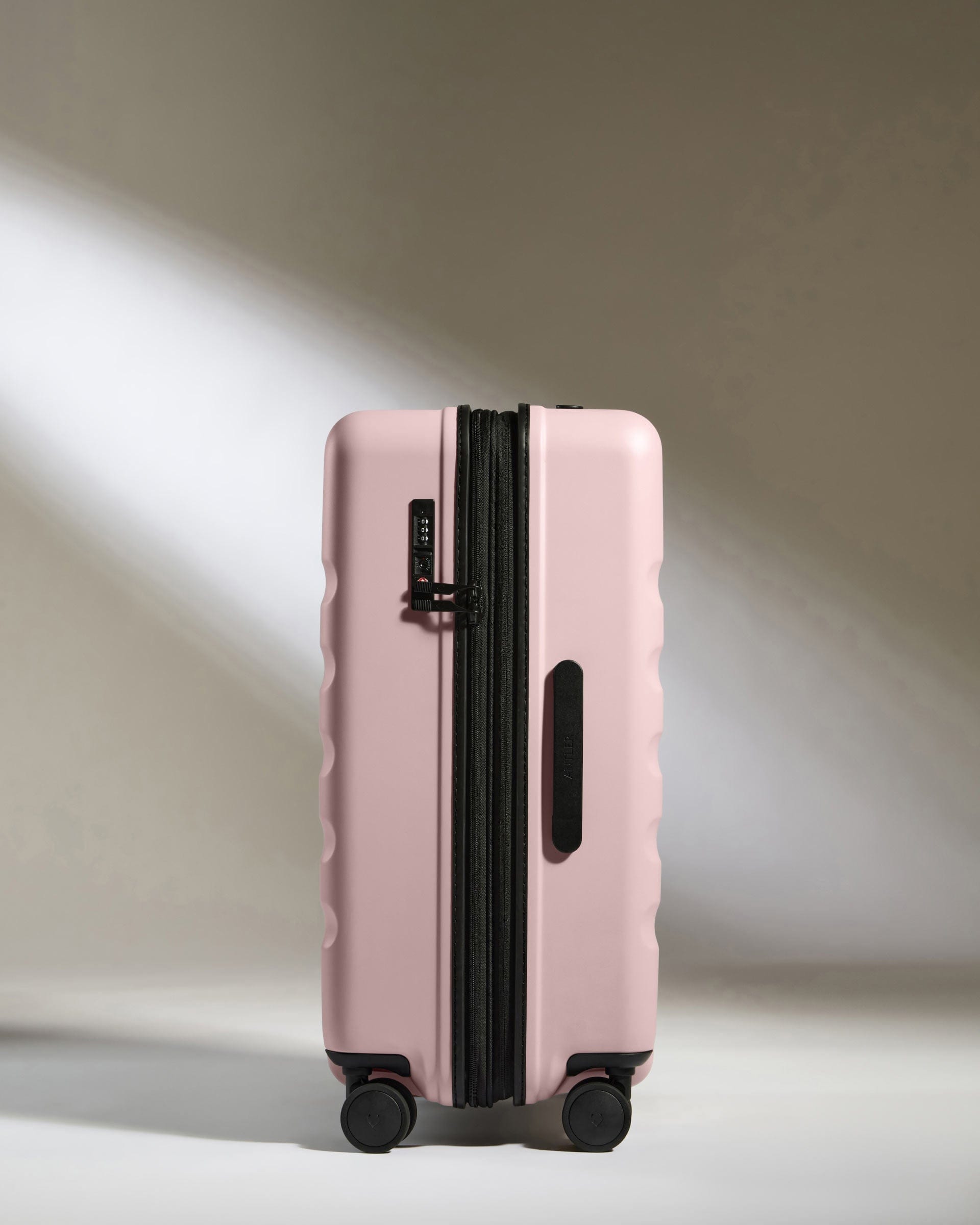 Pale pink suitcase hotsell