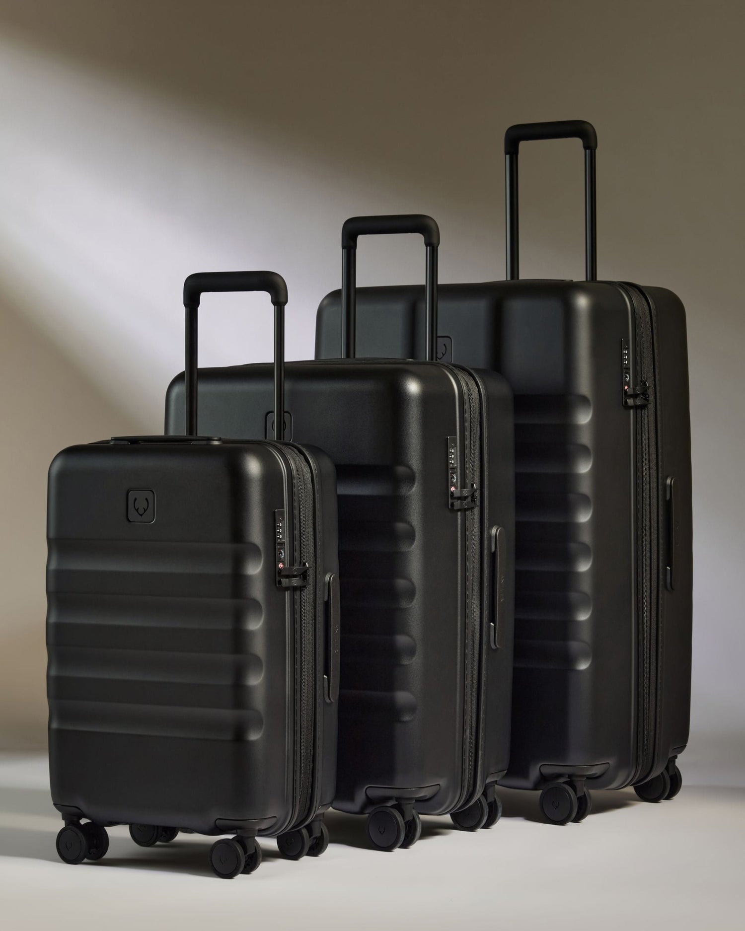 Antler Luggage -  Icon Stripe Set with Expander Cabin in Black - Hard Suitcase Icon Stripe Set with Expander Cabin in Black | Lightweight & Hard Shell Suitcase