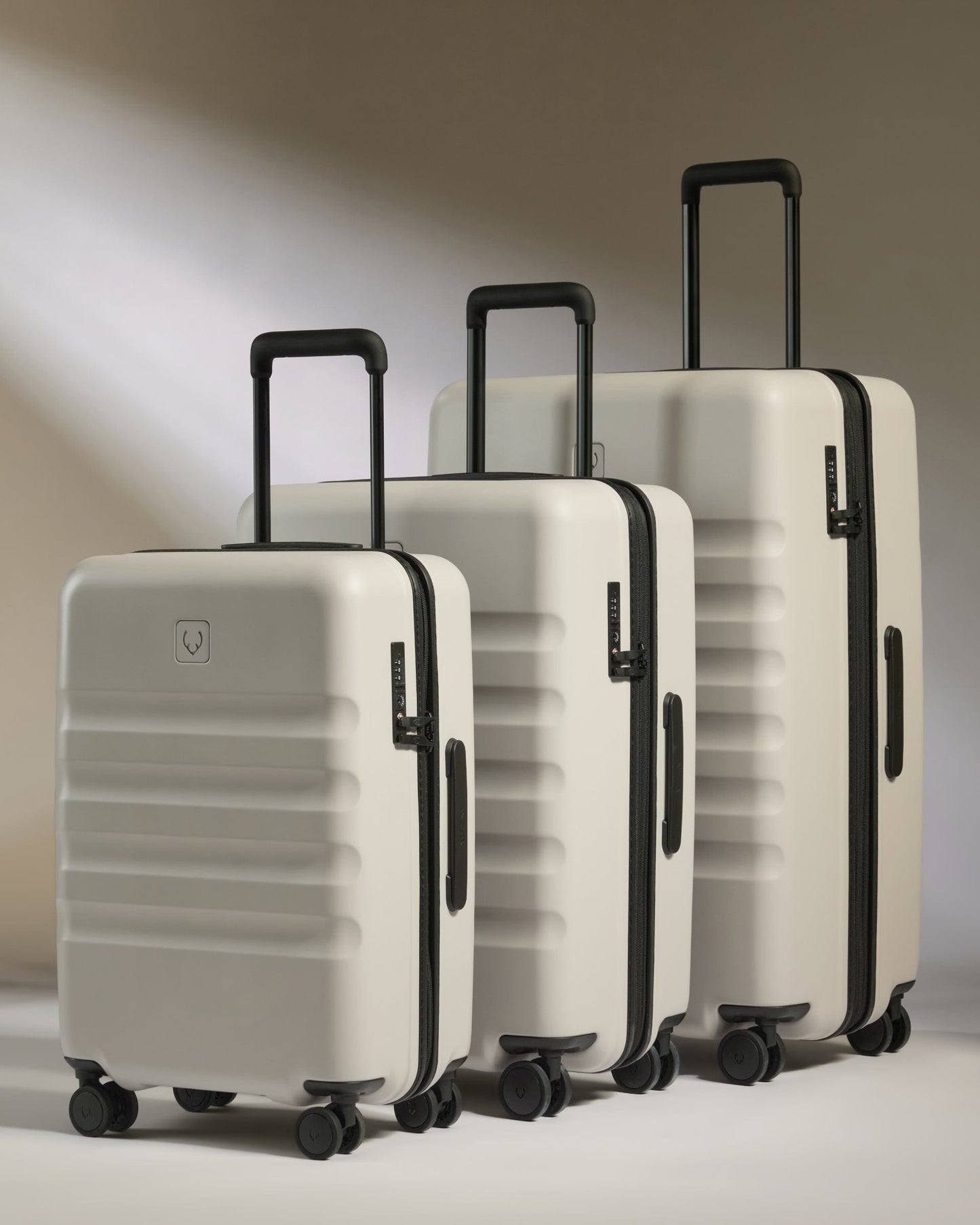 Antler Luggage -  Large Cabin Suitcase Set in Taupe - Icon Stripe - Hard Suitcase Large Cabin Suitcase Set in Taupe - Icon Stripe | Lightweight & Hard Shell Suitcase