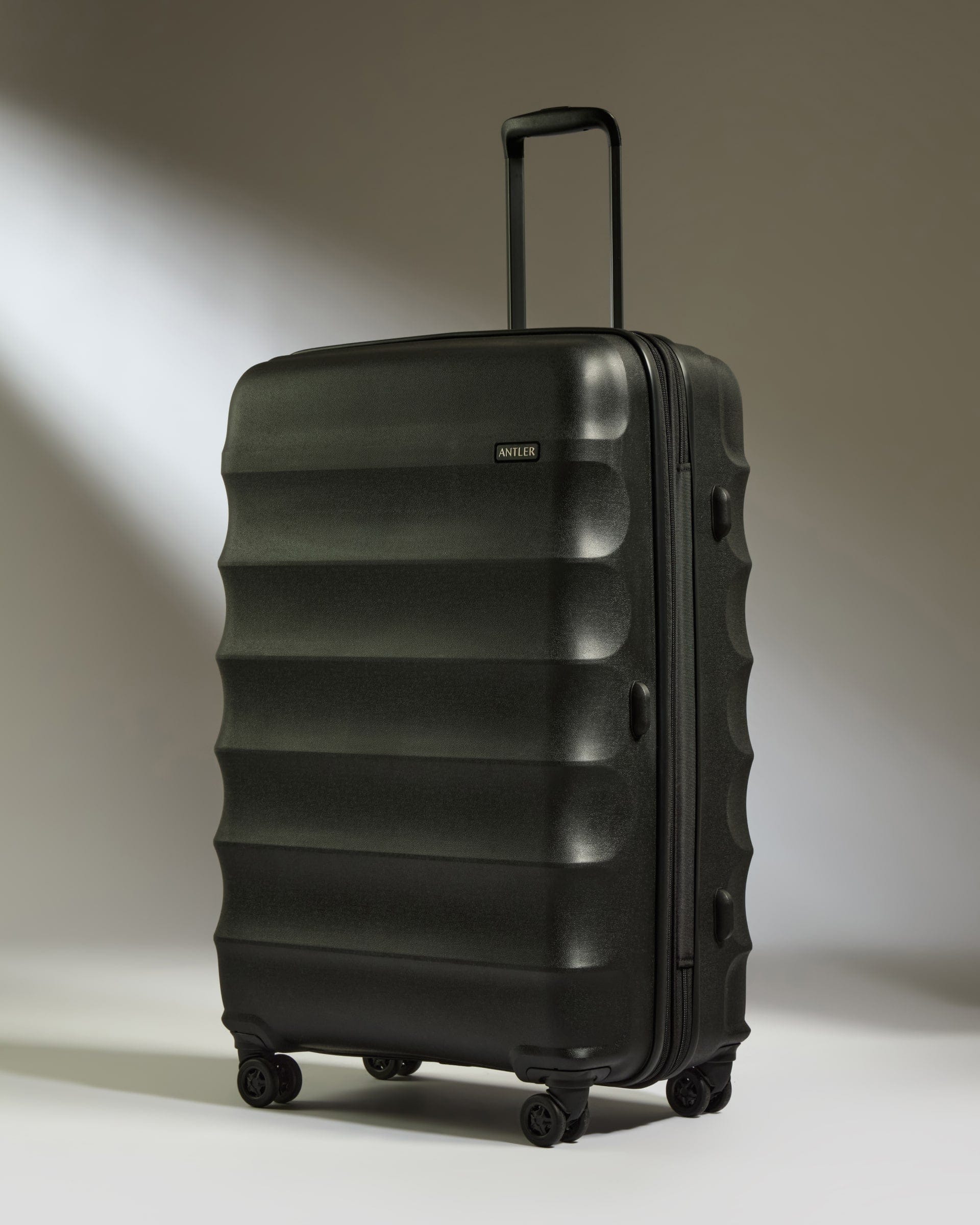 Antler Luggage -  Large Suitcase in Black - Juno - Hard Suitcase Large Suitcase in Black - Juno | Checked Luggage & Large Suitcases