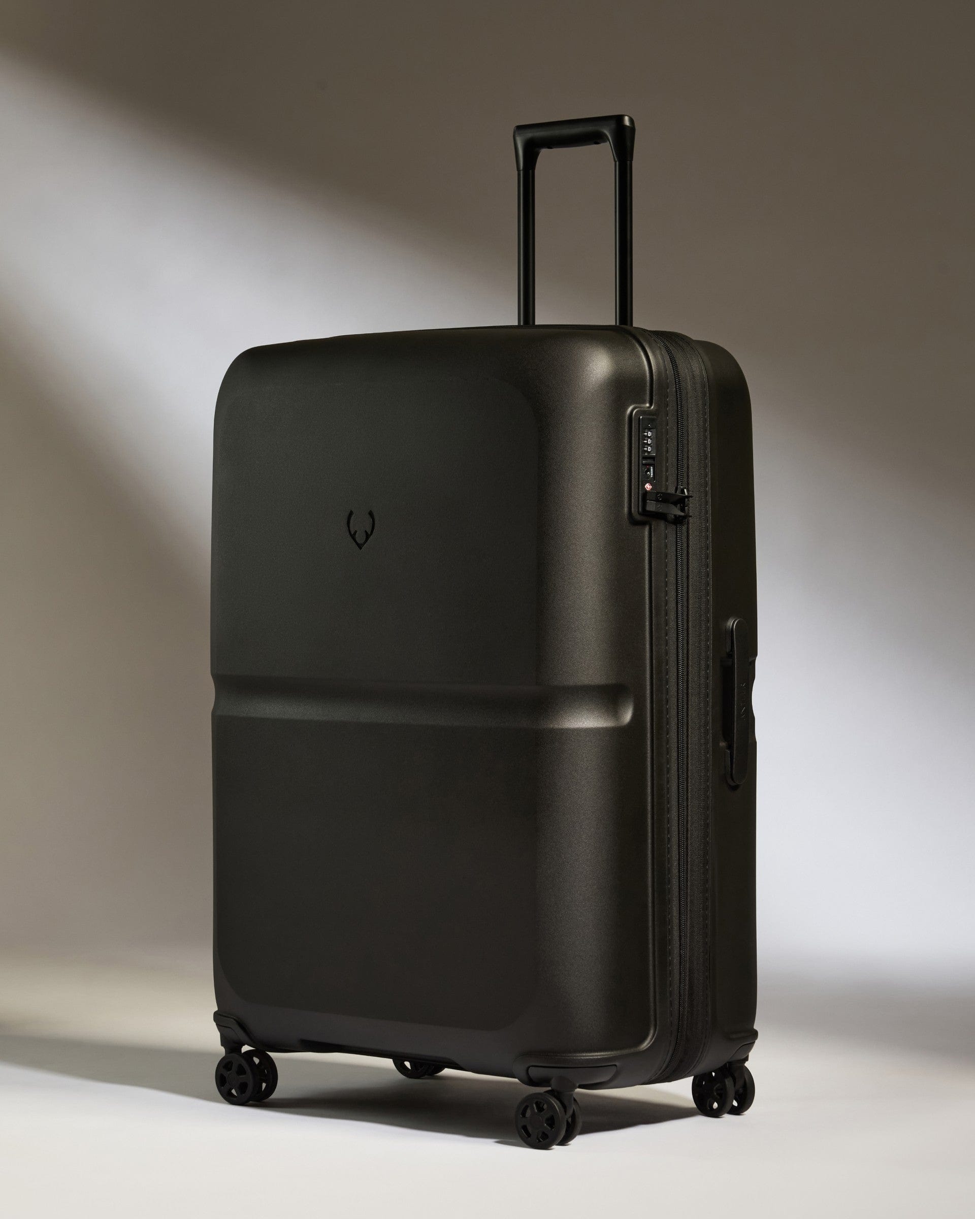 Antler Luggage -  Large Suitcase in Black - Single Stripe - Hard Suitcase Large Suitcase in Black - Single Stripe | Checked Luggage & Large Suitcases