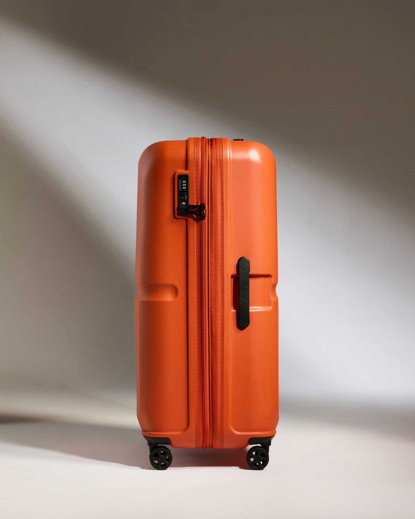 Antler Luggage -  Large Suitcase in Ember Orange - Single Stripe - Hard Suitcase Large Suitcase in Orange - Single Stripe | Checked Luggage & Large Suitcases