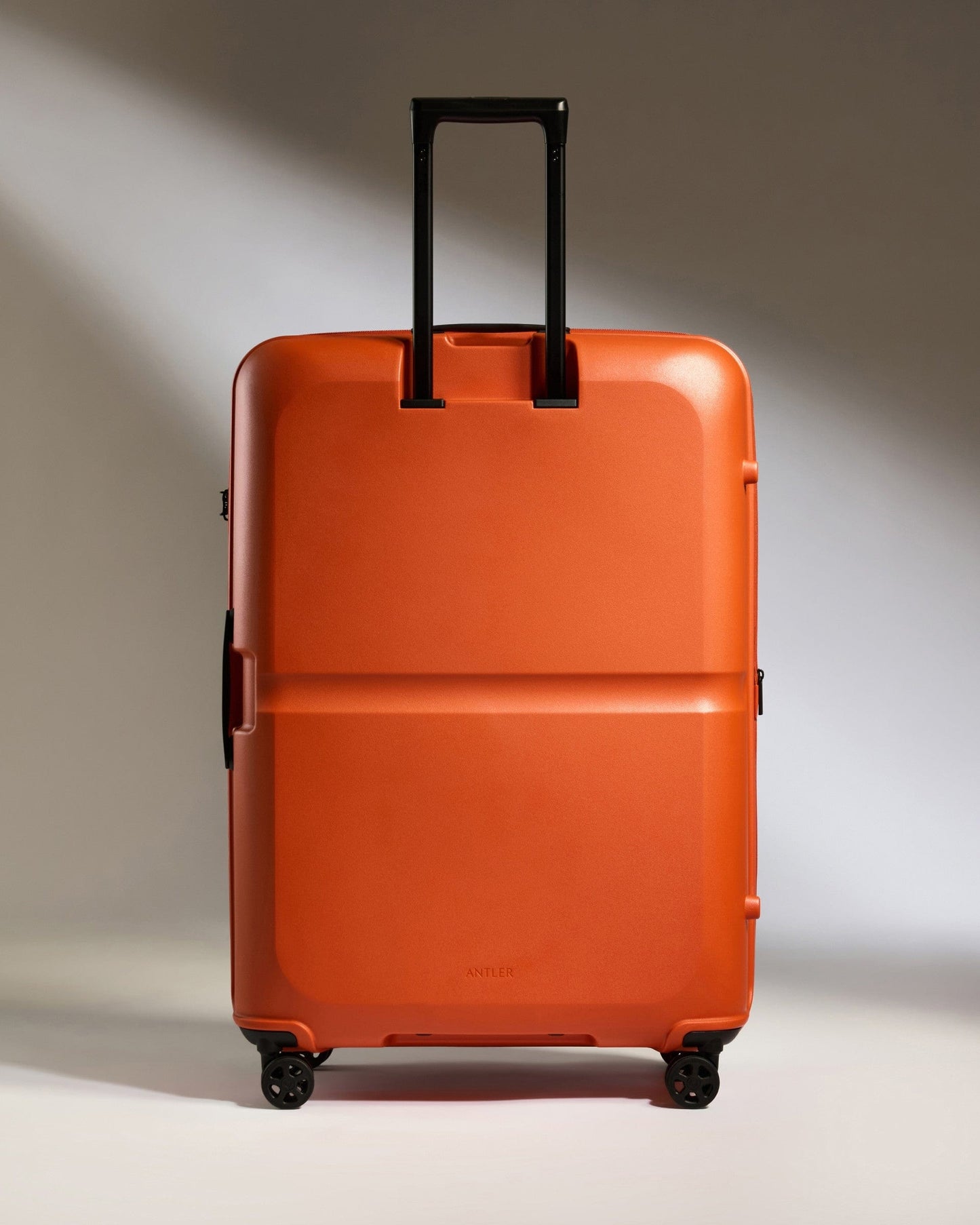 Antler Luggage -  Large Suitcase in Ember Orange - Single Stripe - Hard Suitcase Large Suitcase in Orange - Single Stripe | Checked Luggage & Large Suitcases