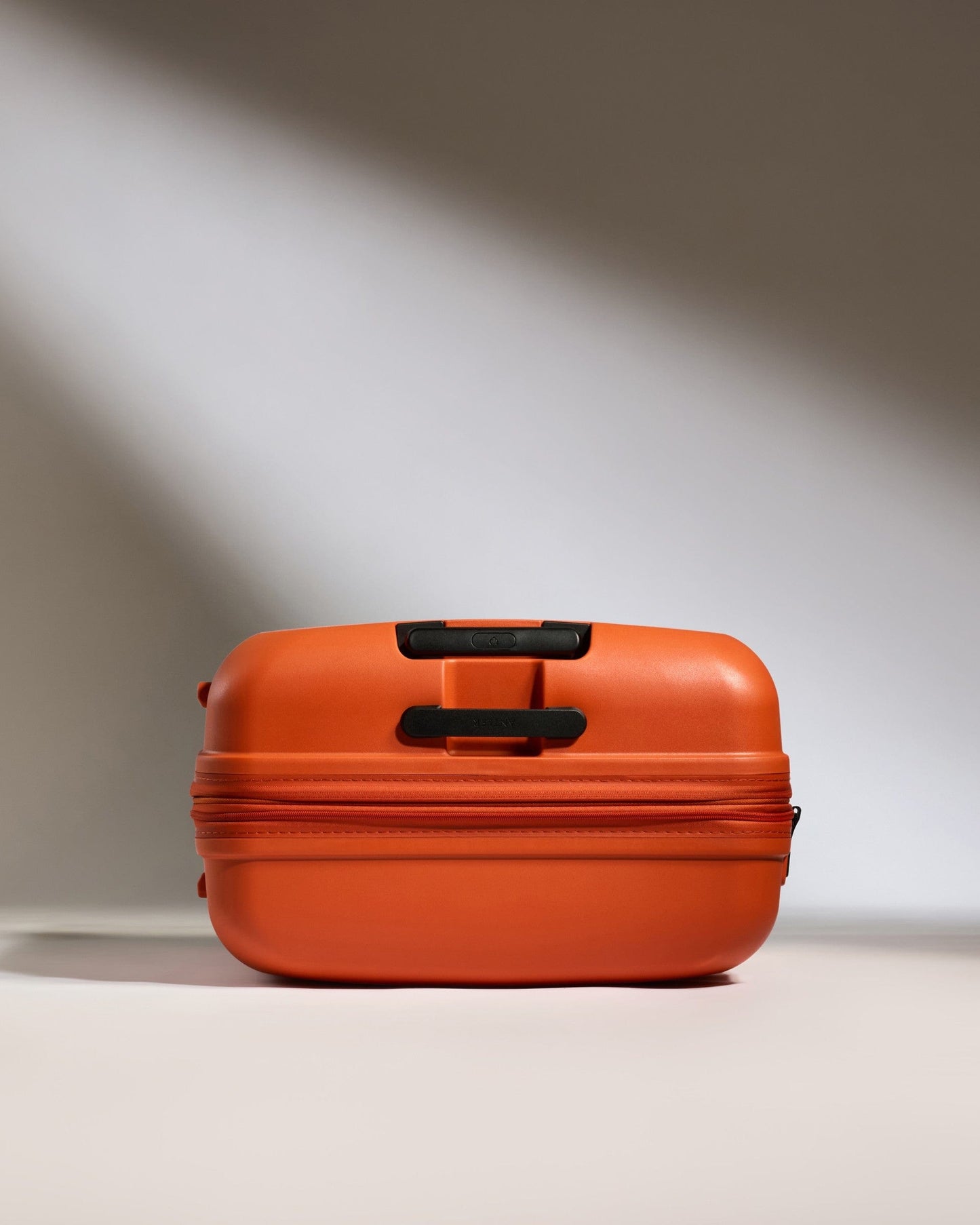 Antler Luggage -  Large Suitcase in Ember Orange - Single Stripe - Hard Suitcase Large Suitcase in Orange - Single Stripe | Checked Luggage & Large Suitcases