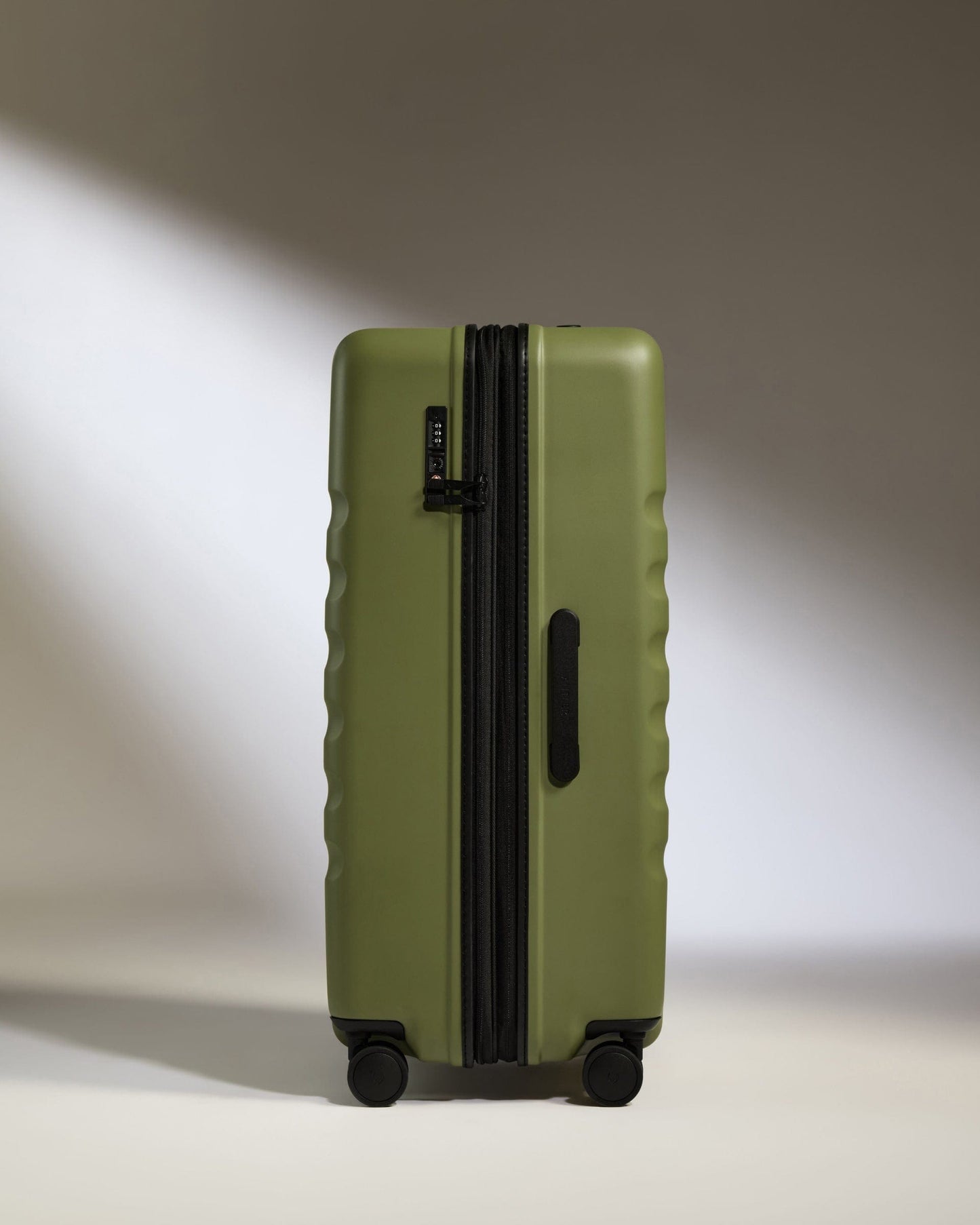 Antler Luggage -  Large Suitcase in Fern Green - Icon Stripe - Hard Suitcase Icon Stripe Large Suitcase in Green | Lightweight & Hard Shell Suitcase