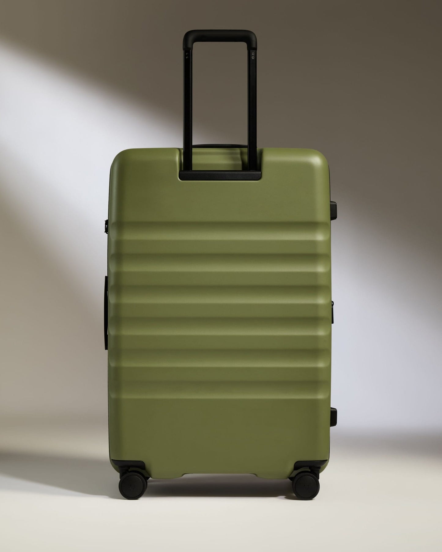 Antler Luggage -  Large Suitcase in Fern Green - Icon Stripe - Hard Suitcase Icon Stripe Large Suitcase in Green | Lightweight & Hard Shell Suitcase