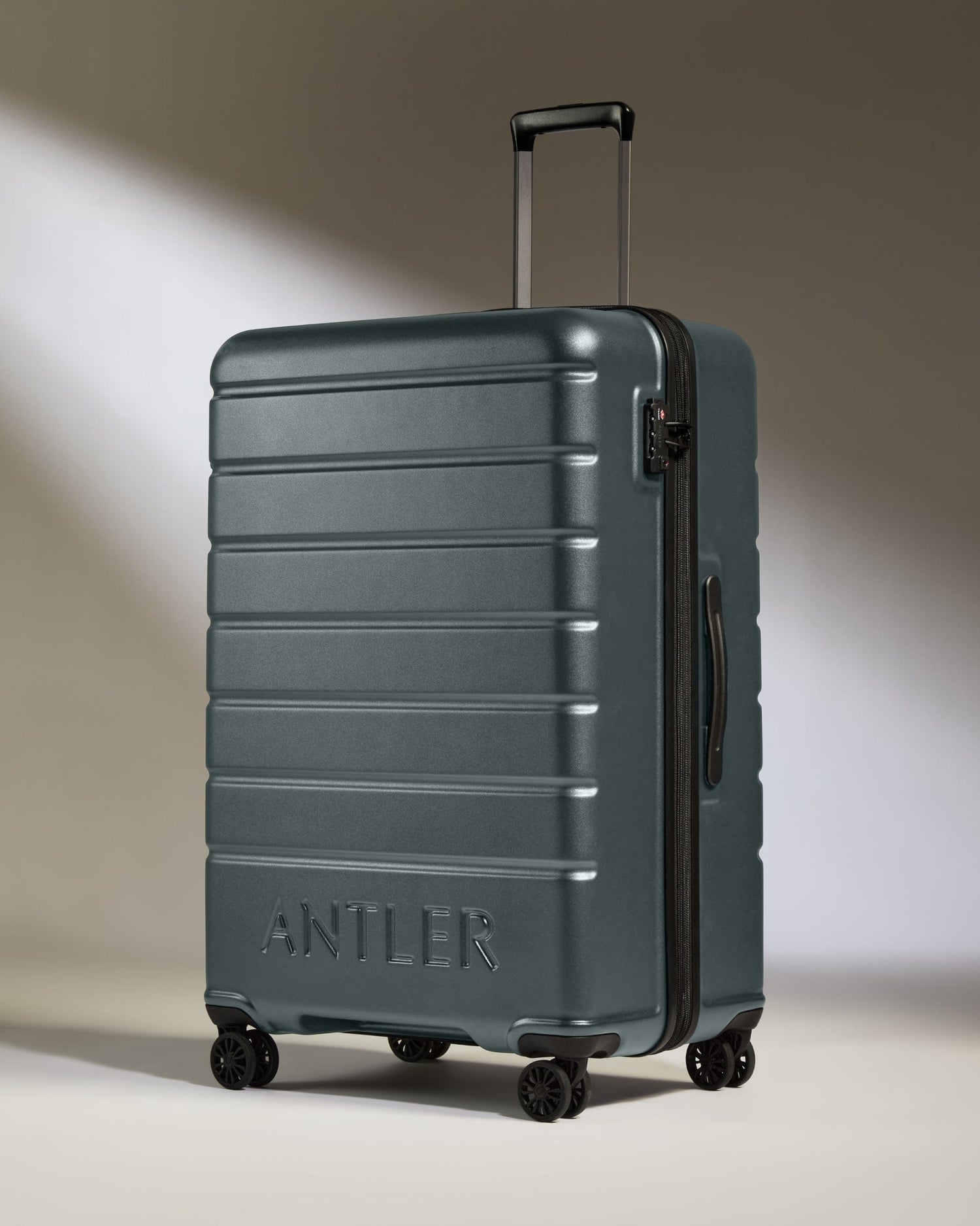 Antler Luggage -  Large Suitcase in Granite Grey - Logo - Hard Suitcases Large Suitcase in Grey - Logo | Lightweight Hard Shell Luggage