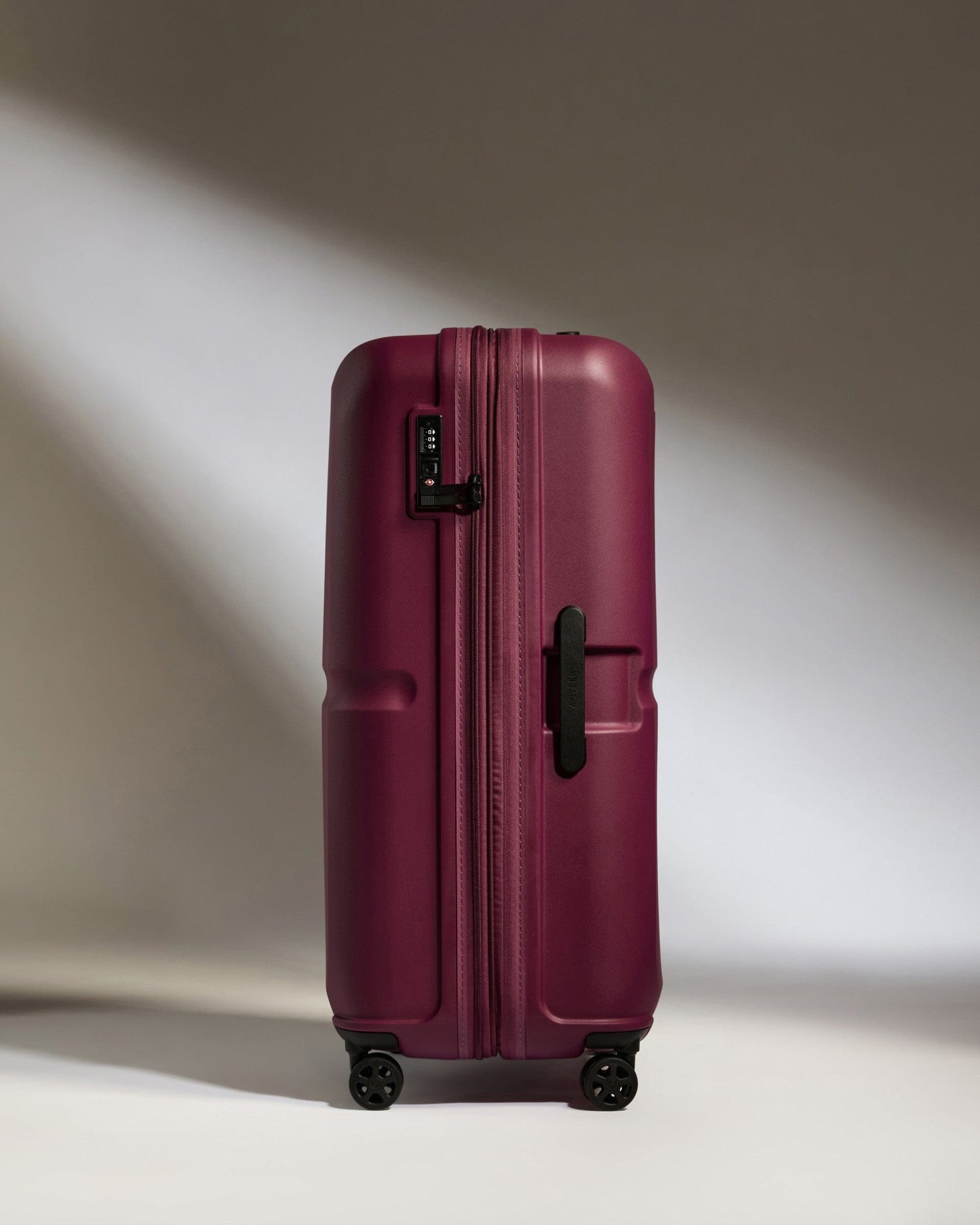 Antler Luggage -  Large Suitcase in Heather Purple - Single Stripe - Hard Suitcase Large Suitcase in Purple - Single Stripe | Checked Luggage & Large Suitcases