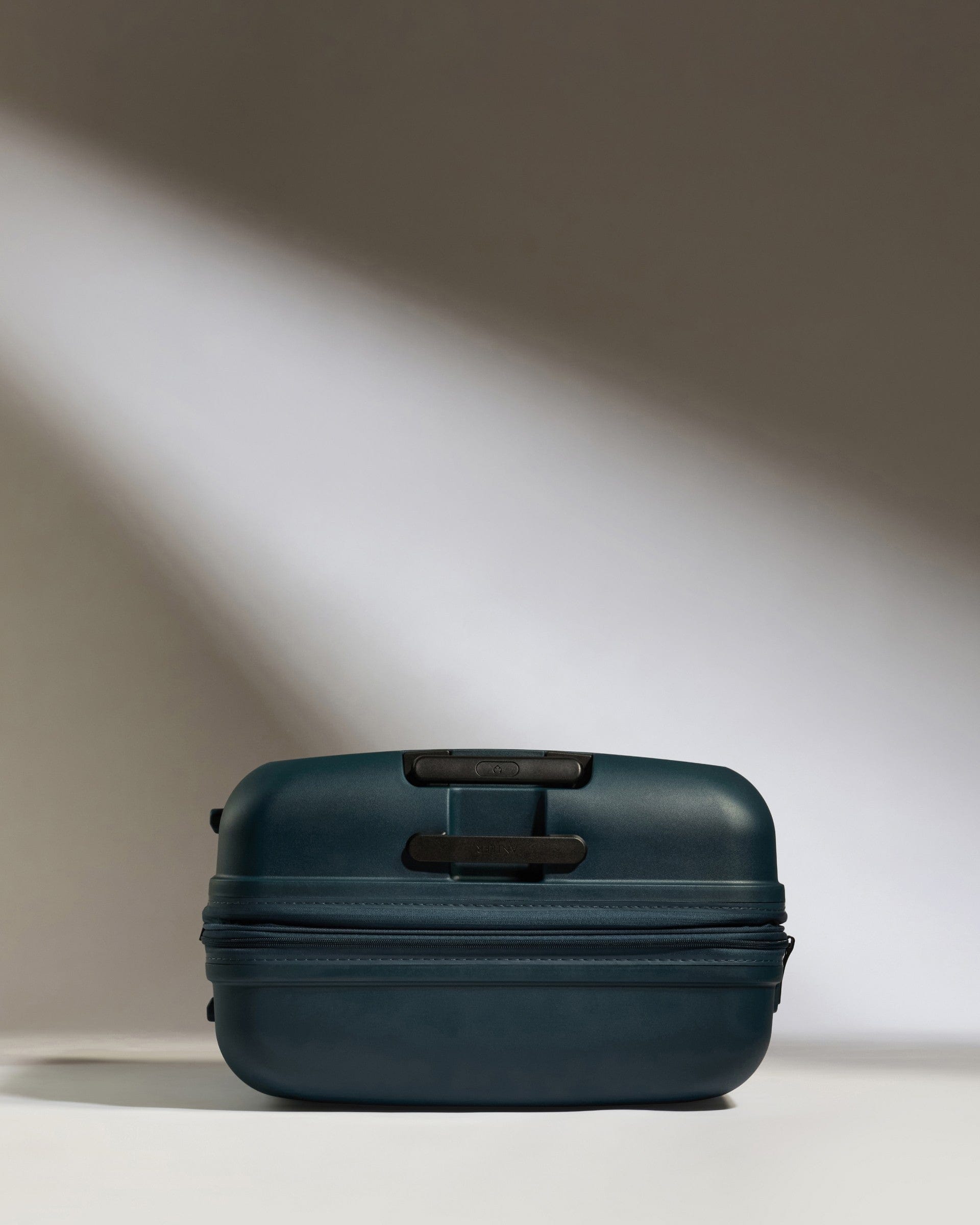 Antler Luggage -  Large Suitcase in Indigo Blue - Single Stripe - Hard Suitcase Large Suitcase in Navy - Single Stripe | Checked Luggage & Large Suitcases