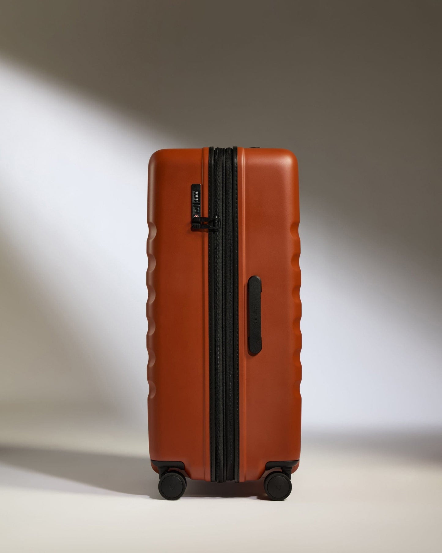 Antler Luggage -  Large Suitcase in Maple Red - Icon Stripe - Hard Suitcase Icon Stripe Large Suitcase in Red | Lightweight & Hard Shell Suitcase