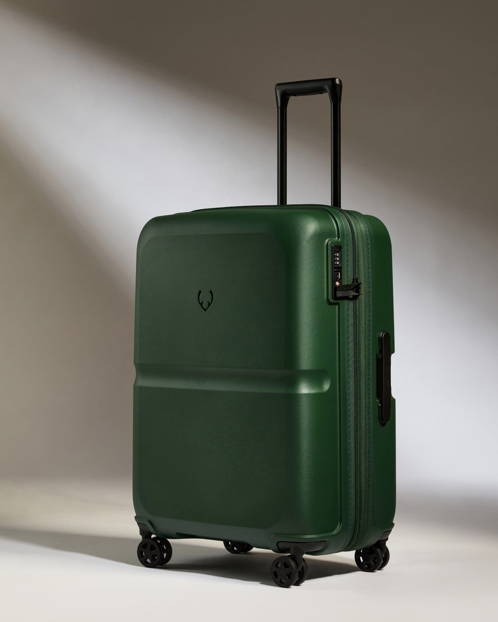 Antler Luggage -  Medium Suitcase in Antler Green - Single Stripe - Hard Suitcase Medium Suitcase in Green - Single Stripe | Check Luggage