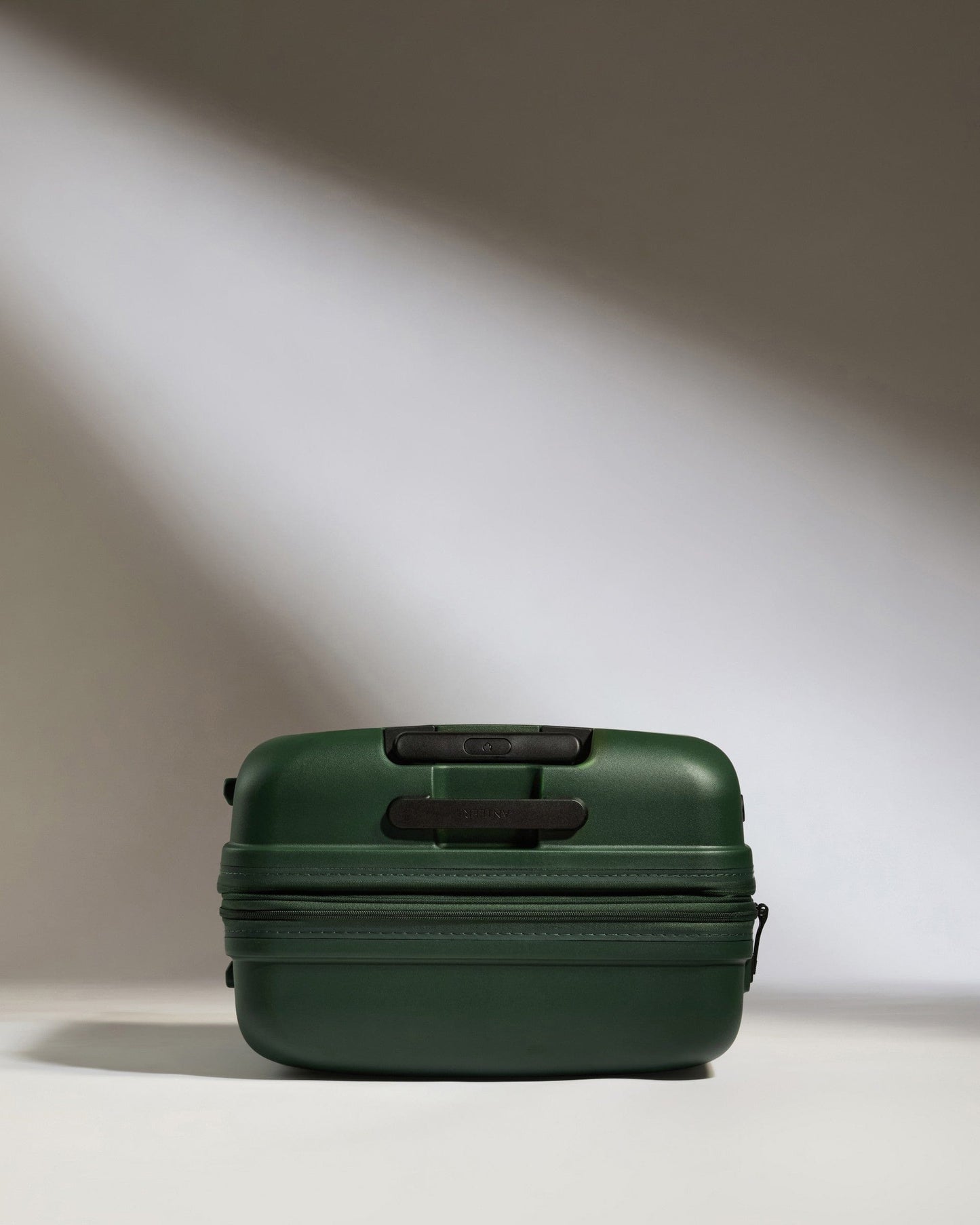 Antler Luggage -  Medium Suitcase in Antler Green - Single Stripe - Hard Suitcase Medium Suitcase in Green - Single Stripe | Check Luggage