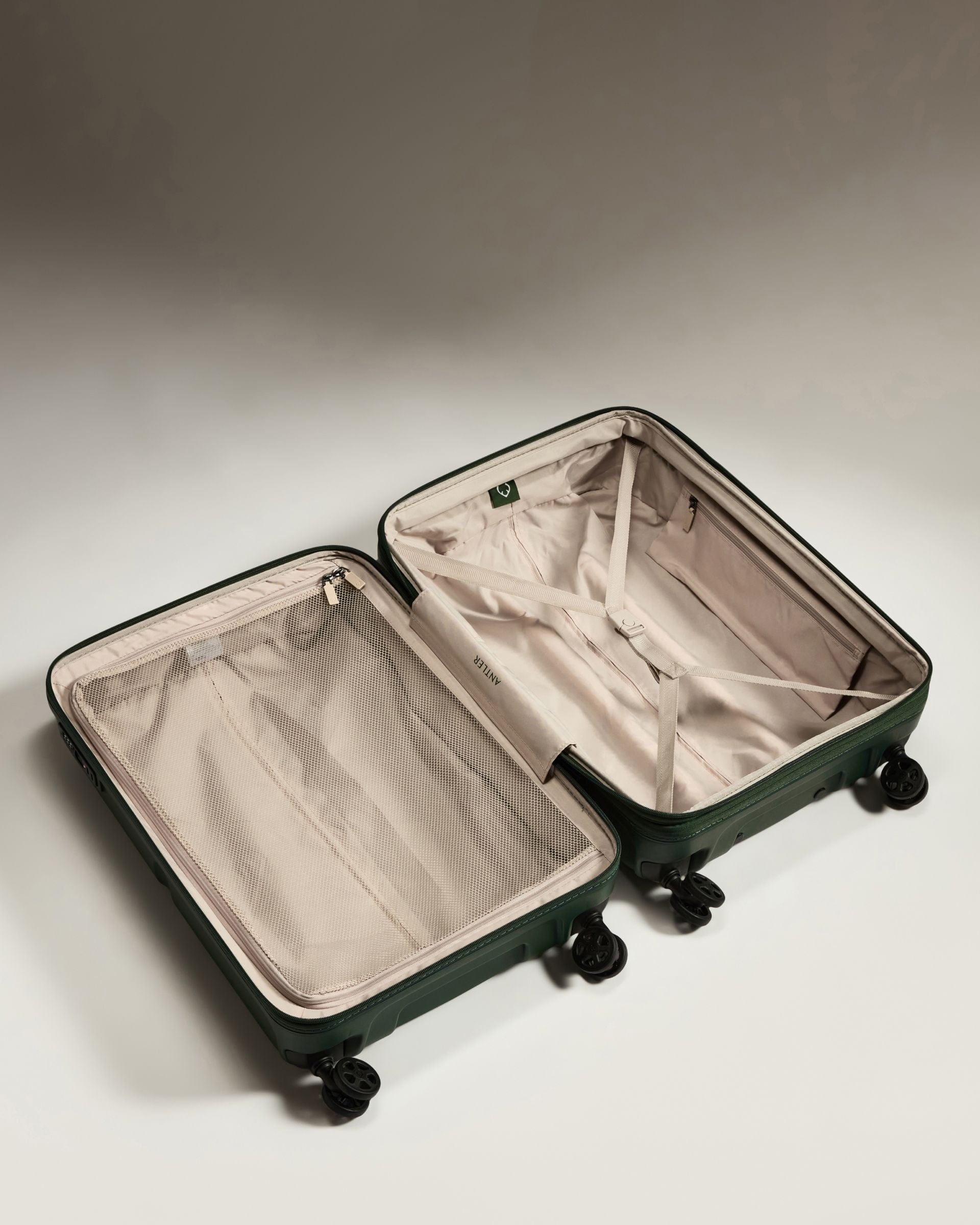 Antler Luggage -  Medium Suitcase in Antler Green - Single Stripe - Hard Suitcase Medium Suitcase in Green - Single Stripe | Check Luggage