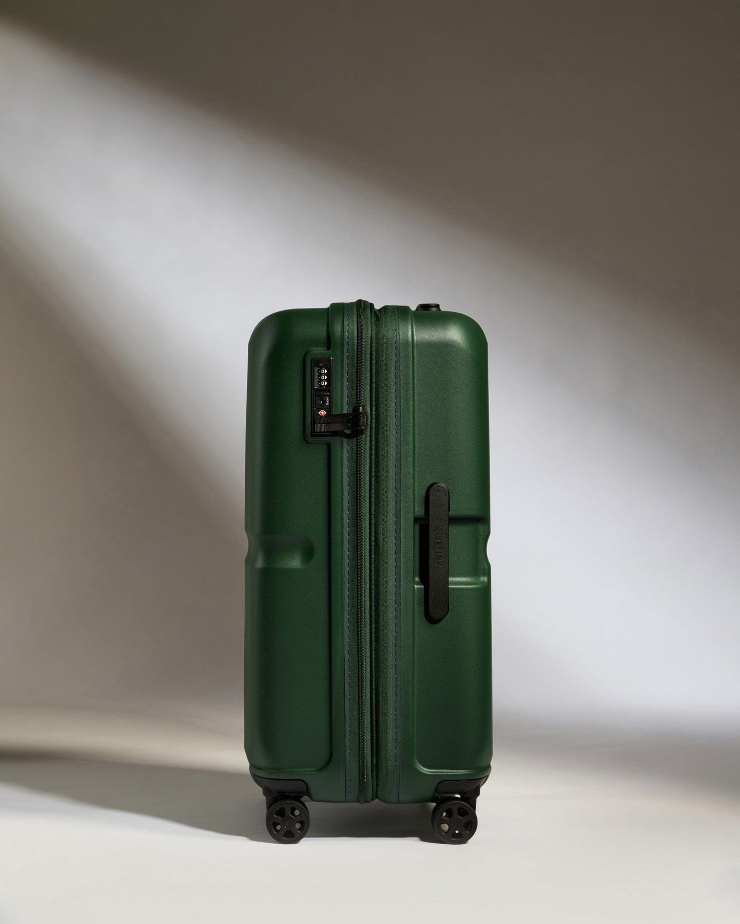 Antler Luggage -  Medium Suitcase in Antler Green - Single Stripe - Hard Suitcase Medium Suitcase in Green - Single Stripe | Check Luggage