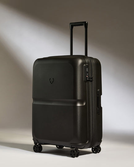 Antler Luggage -  Medium Suitcase in Black - Single Stripe - Hard Suitcase Medium Suitcase in Black - Single Stripe | Check Luggage