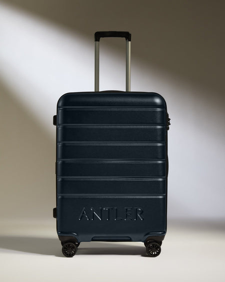 Antler Luggage -  Medium Suitcase in Dark Navy - Logo - Hard Suitcases Medium Suitcase Dark Navy - Logo | Lightweight Hard Shell Luggage