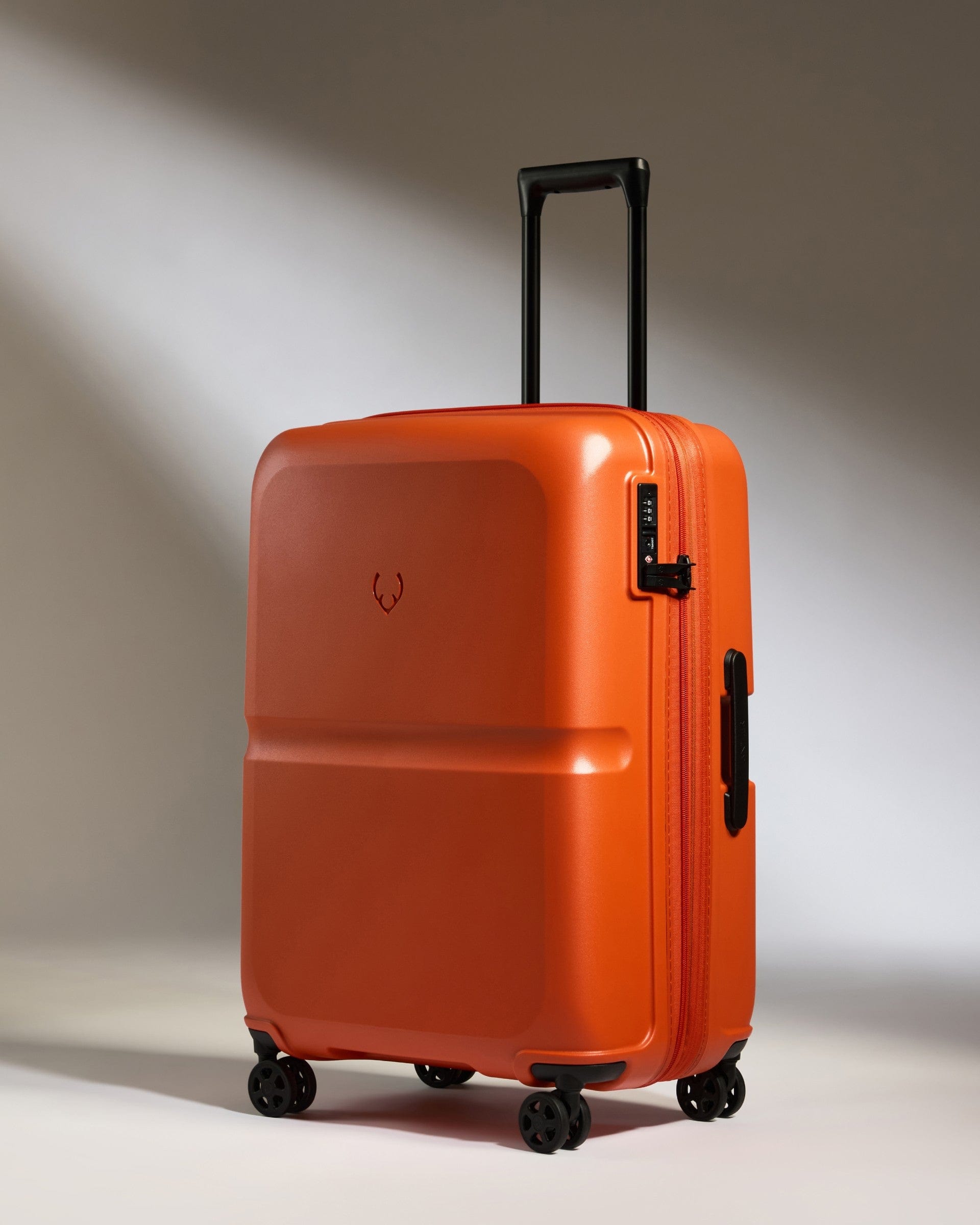 Antler Luggage -  Medium Suitcase in Ember Orange - Single Stripe - Hard Suitcase Medium Suitcase in Orange - Single Stripe | Check Luggage