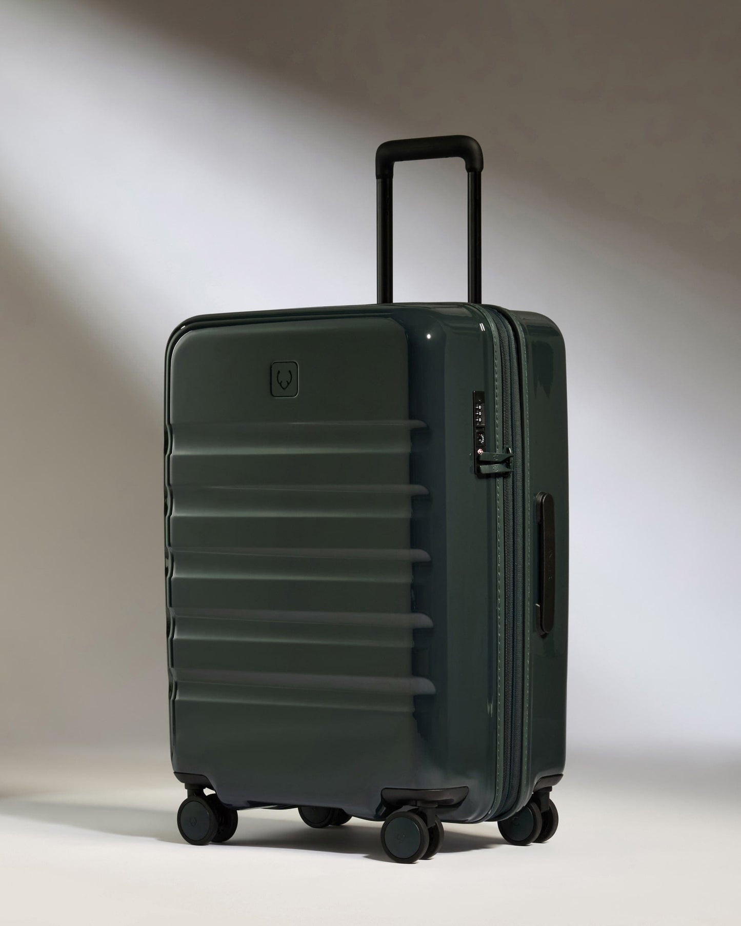 Antler Luggage -  Medium Suitcase in Green Gloss - Icon Stripe - Hard Suitcase Medium suitcase in Green Gloss - Icon Stripe | Lightweight & Hard Shell Suitcase