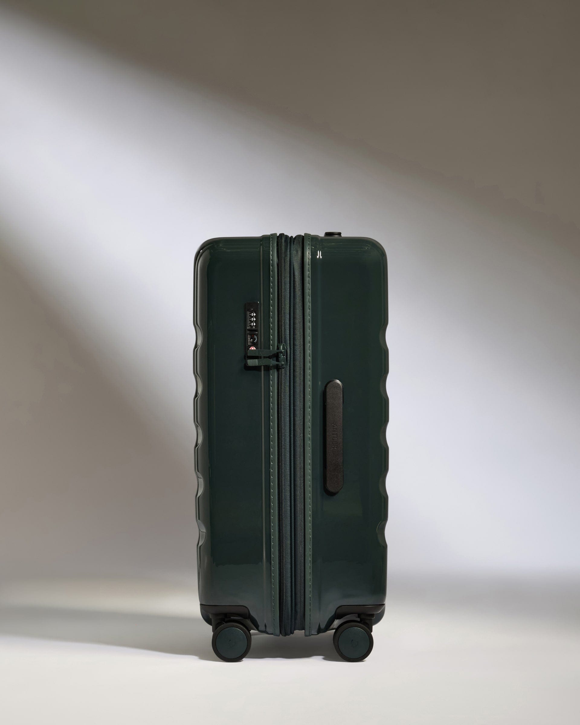 Antler Luggage -  Medium Suitcase in Green Gloss - Icon Stripe - Hard Suitcase Medium suitcase in Green Gloss - Icon Stripe | Lightweight & Hard Shell Suitcase