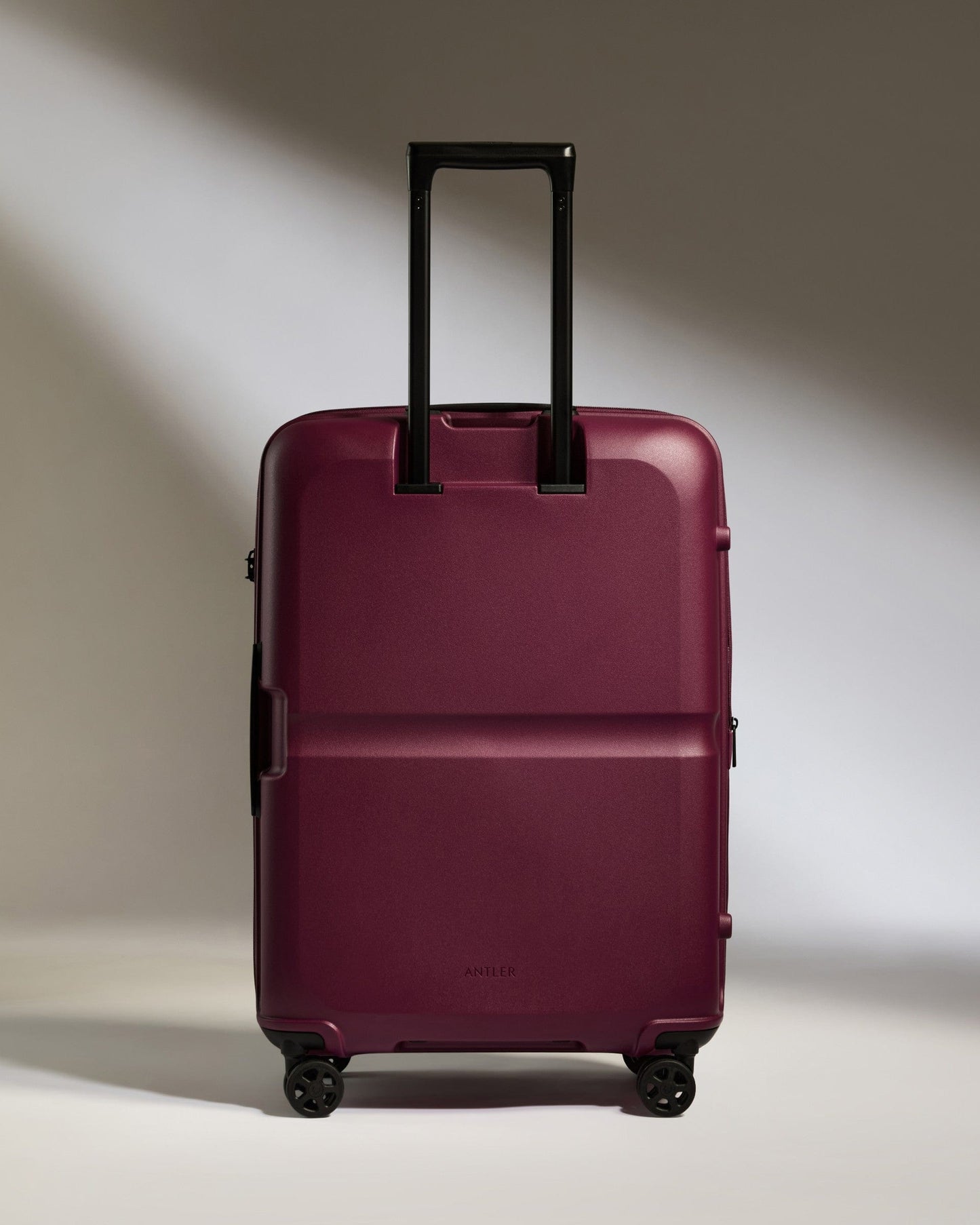 Antler Luggage -  Medium Suitcase in Heather Purple - Single Stripe - Hard Suitcase Medium Suitcase in Purple - Single Stripe | Check Luggage