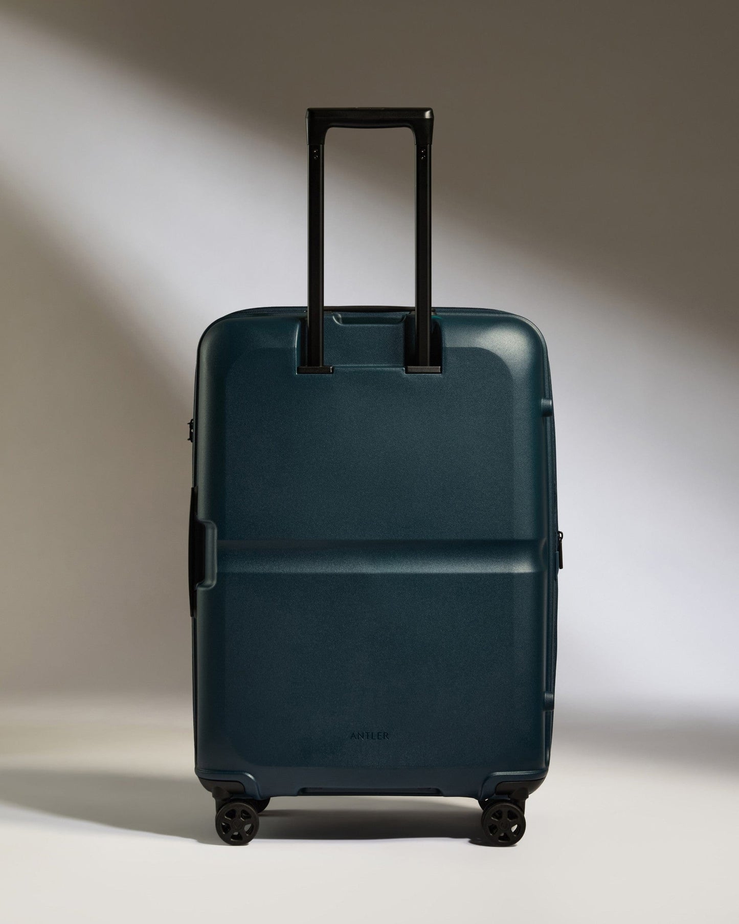 Antler Luggage -  Medium Suitcase in Indigo Blue - Single Stripe - Hard Suitcase Medium Suitcase in Navy - Single Stripe | Check Luggage