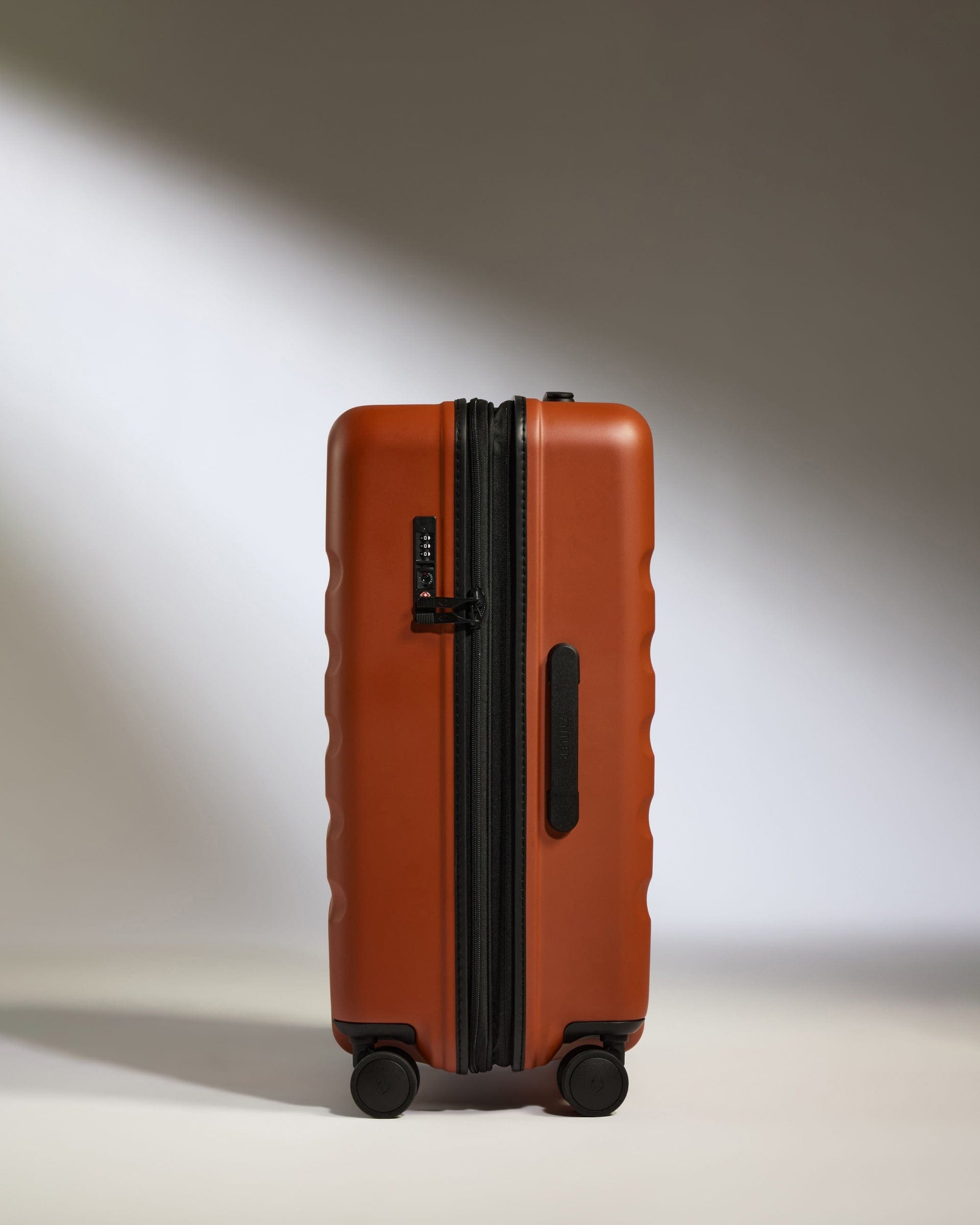 Antler Luggage -  Medium Suitcase in Maple Red - Icon Stripe - Hard Suitcase Icon Stripe Medium Suitcase in Red | Lightweight & Hard Shell Suitcase