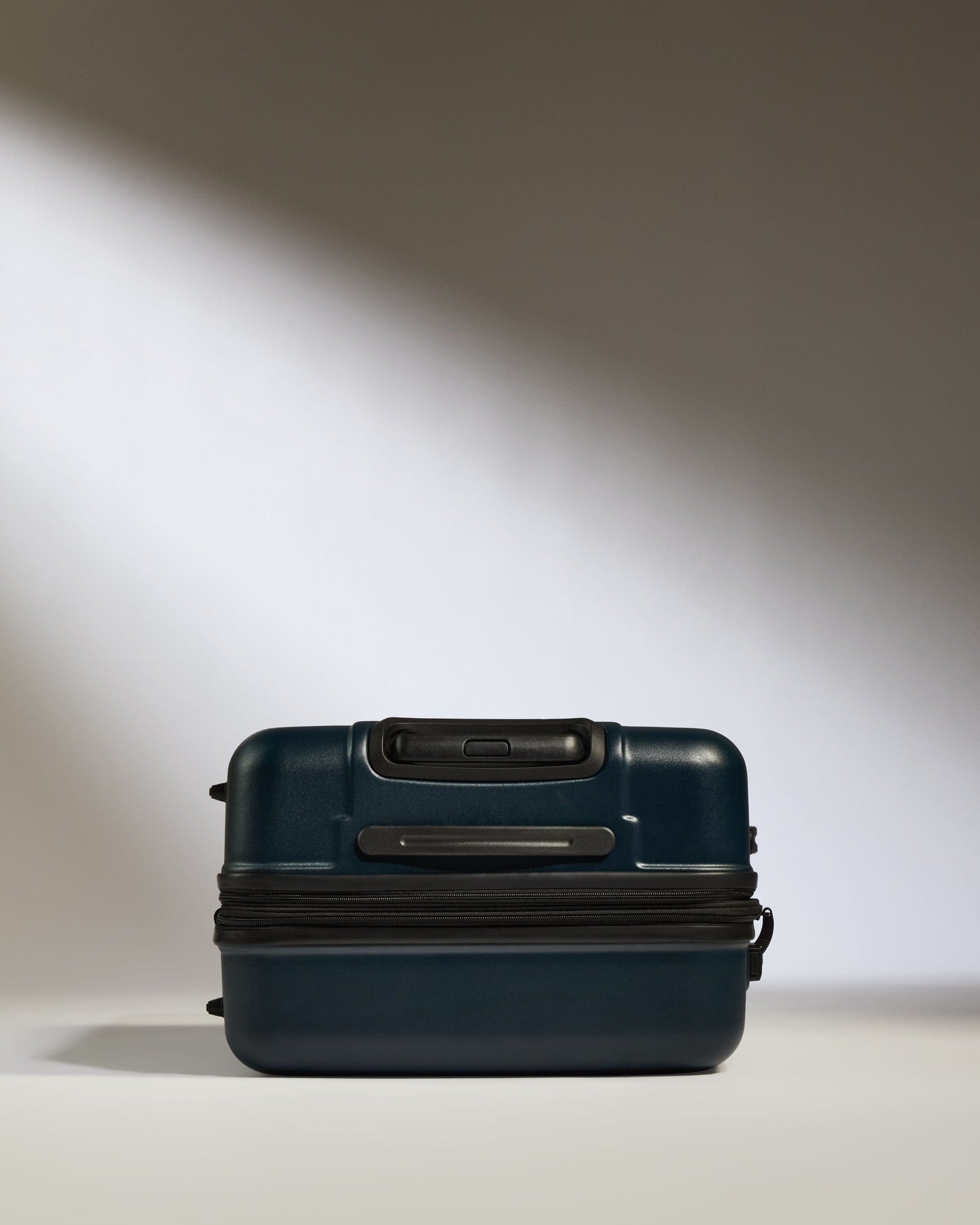 Antler Luggage -  Medium Suitcase in Midnight Blue - Logo - Hard Suitcases Medium Suitcase Midnight Blue - Logo | Lightweight Hard Shell Luggage