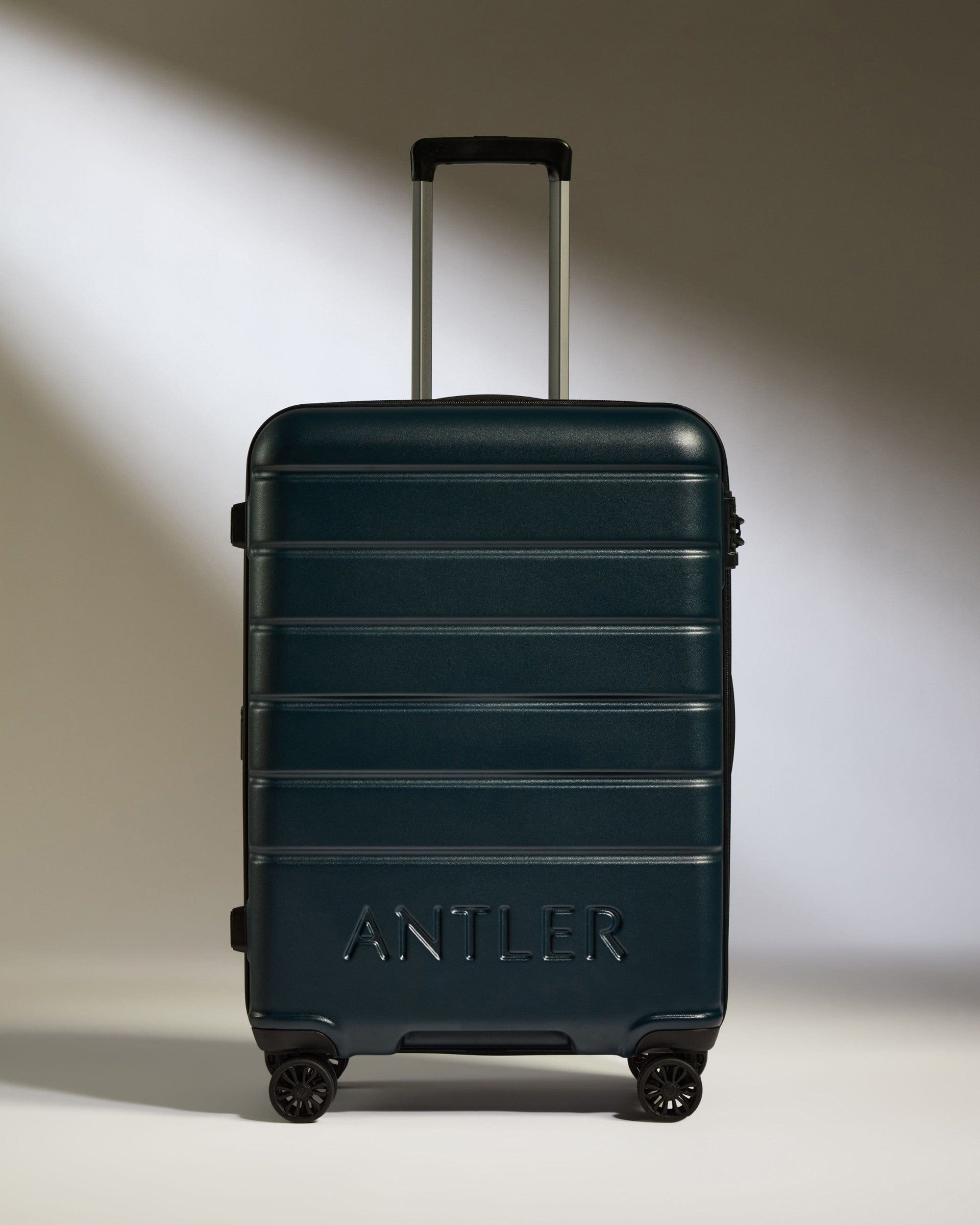 Antler Luggage -  Medium Suitcase in Midnight Blue - Logo - Hard Suitcases Medium Suitcase Midnight Blue - Logo | Lightweight Hard Shell Luggage