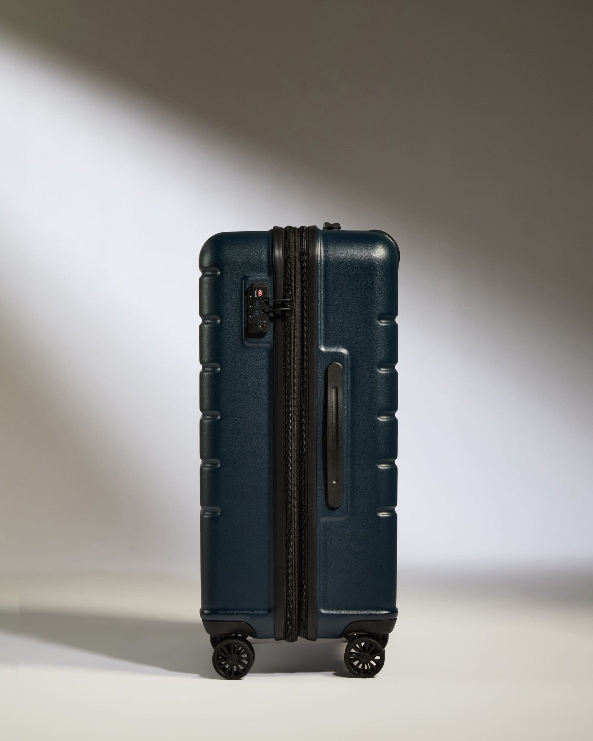 Antler Luggage -  Medium Suitcase in Midnight Blue - Logo - Hard Suitcases Medium Suitcase Midnight Blue - Logo | Lightweight Hard Shell Luggage