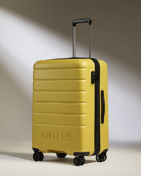 Antler Luggage -  Medium Suitcase in Mustard Yellow - Logo - Hard Suitcases Medium Suitcase Yellow - Logo | Lightweight Hard Shell Luggage