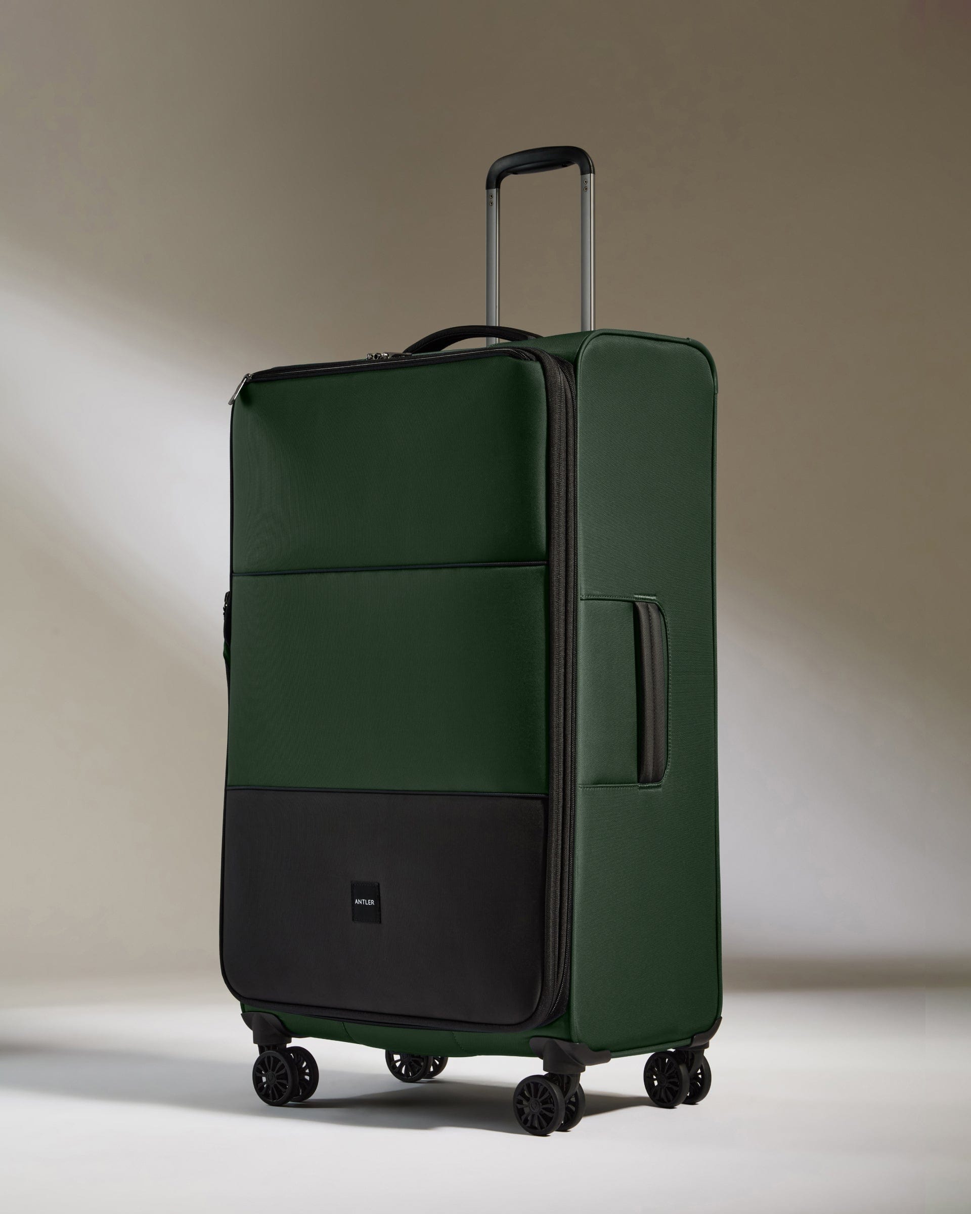 Lightest Large Suitcase in Antler Green Soft Stripe