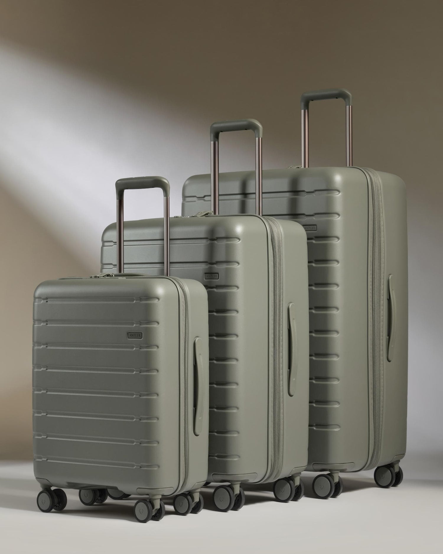 Antler Luggage -  Stamford 2.0 set in field green - Hard Suitcases Stamford 2.0 Set of 3 Suitcases Green | Hard Luggage 