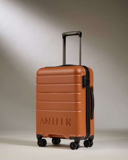 Antler UK Luggage -  Logo Cabin in Amber - Hard Suitcases Logo Cabin Suitcase Orange | Lightweight Hard Shell Luggage