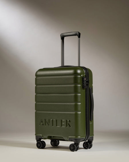 Antler UK Luggage -  Logo Cabin in Pine - Hard Suitcases Logo Cabin Suitcase Green | Lightweight Hard Shell Luggage